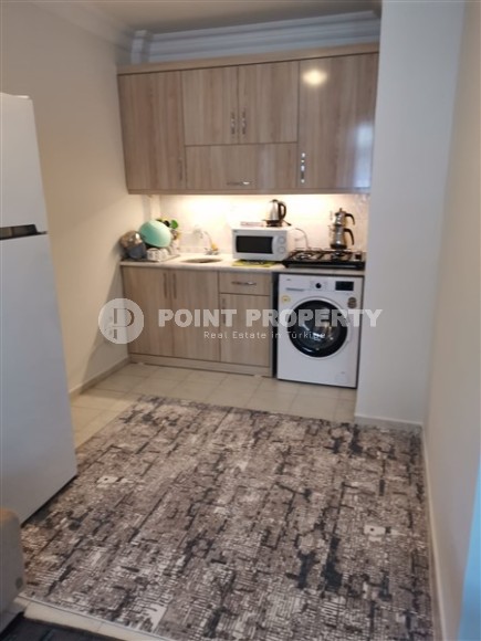 Small comfortable apartment 1+1, on an area of 50 m2, in the center of the modern area of Alanya - Mahmutlar-id-6356-photo-3