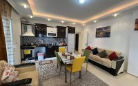 Spacious one bedroom apartment, on an area of 75 m2, in the center of a modern, developed area of Alanya - Mahmutlar-id-6361-photo-3