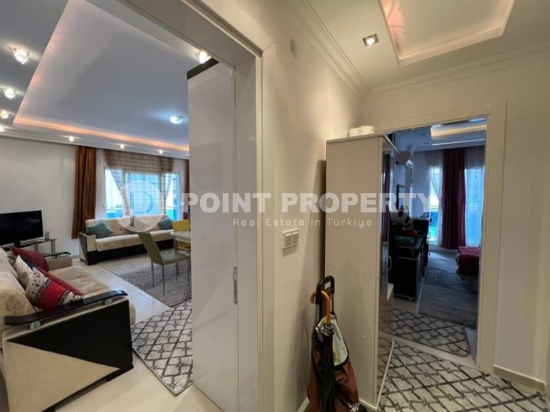 Spacious one bedroom apartment, on an area of 75 m2, in the center of a modern, developed area of Alanya - Mahmutlar-id-6361-photo-7