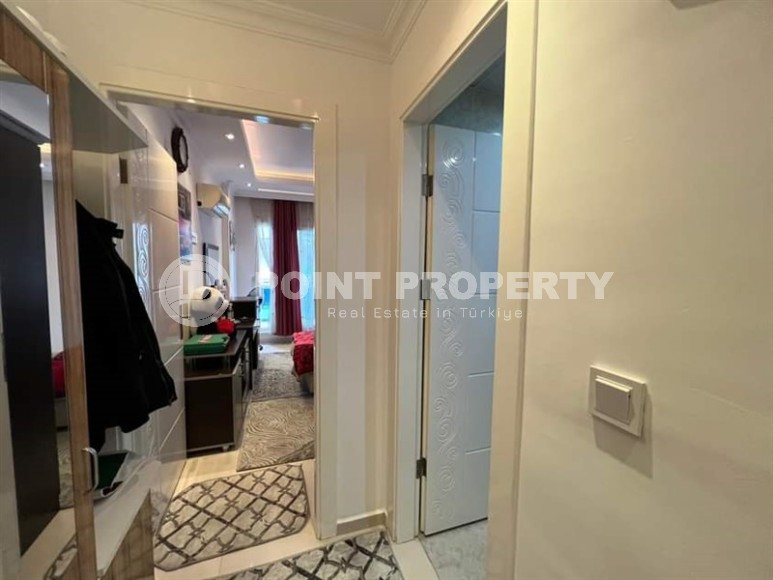 Spacious one bedroom apartment, on an area of 75 m2, in the center of a modern, developed area of Alanya - Mahmutlar-id-6361-photo-8