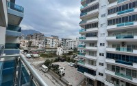 Spacious one bedroom apartment, on an area of 75 m2, in the center of a modern, developed area of Alanya - Mahmutlar-id-6361-photo-12
