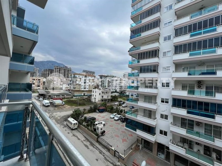 Spacious one bedroom apartment, on an area of 75 m2, in the center of a modern, developed area of Alanya - Mahmutlar-id-6361-photo-12