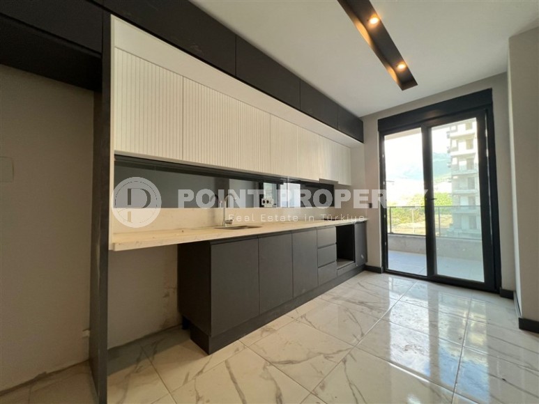 New apartment with views of the Taurus Mountains, 600 meters from the sea, in the Mahmutlar area-id-6365-photo-2