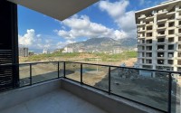 New apartment with views of the Taurus Mountains, 600 meters from the sea, in the Mahmutlar area-id-6365-photo-11