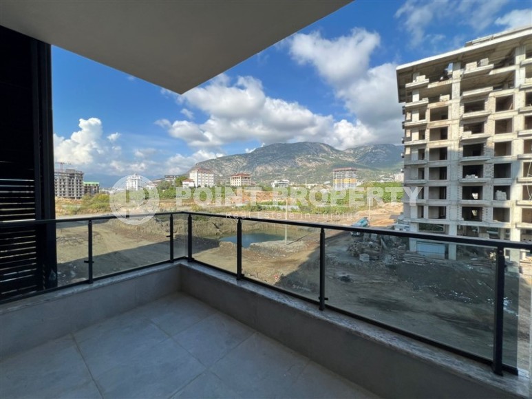 New apartment with views of the Taurus Mountains, 600 meters from the sea, in the Mahmutlar area-id-6365-photo-11