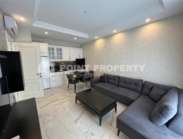 Современная квартира 1+1, общей площадью 60 м2, на первой линии от моря, в центре района Кестель-id-6374-фото-1