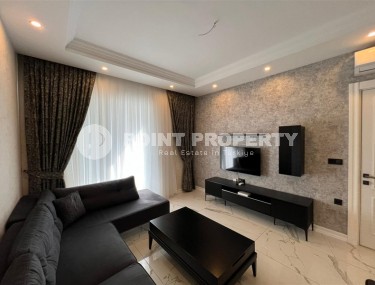 Современная квартира 1+1, общей площадью 60 м2, на первой линии от моря, в центре района Кестель-id-6374-фото-2