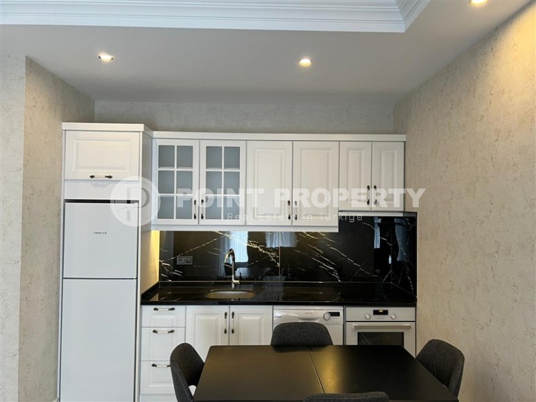 Современная квартира 1+1, общей площадью 60 м2, на первой линии от моря, в центре района Кестель-id-6374-фото-3