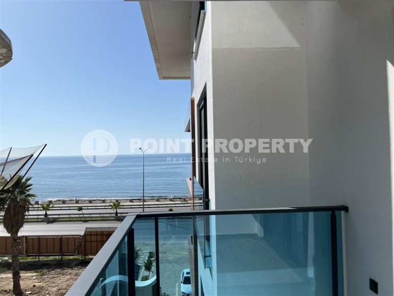 Современная квартира 1+1, общей площадью 60 м2, на первой линии от моря, в центре района Кестель-id-6374-фото-9