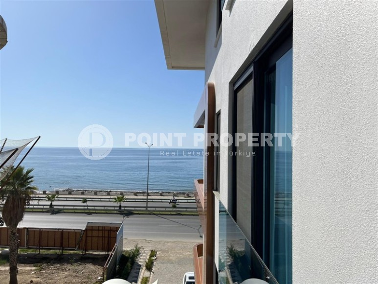 Современная квартира 1+1, общей площадью 60 м2, на первой линии от моря, в центре района Кестель-id-6374-фото-10