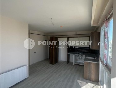 Two new apartments on the 9th and 10th floors, two and a half kilometers from the sea, in the resort area of Mersin - Mezitli-id-6380-photo-2