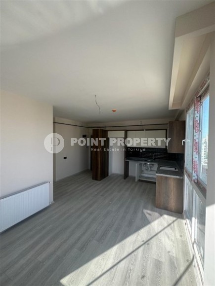 Две новые квартиры на 9-м и 10-м этажах, в двух с половиной километрах от моря, в курортном районе Мерсина - Мезитли-id-6380-фото-2