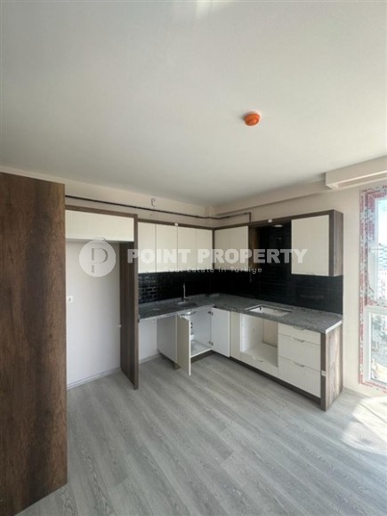 Две новые квартиры на 9-м и 10-м этажах, в двух с половиной километрах от моря, в курортном районе Мерсина - Мезитли-id-6380-фото-3