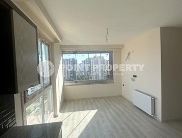 Two new apartments on the 9th and 10th floors, two and a half kilometers from the sea, in the resort area of Mersin - Mezitli-id-6380-photo-4