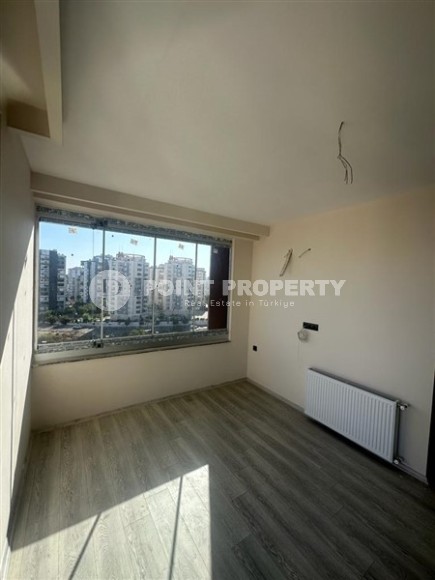 Две новые квартиры на 9-м и 10-м этажах, в двух с половиной километрах от моря, в курортном районе Мерсина - Мезитли-id-6380-фото-7