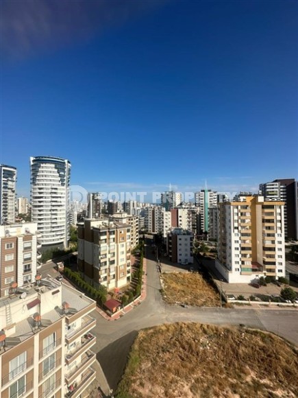 Две новые квартиры на 9-м и 10-м этажах, в двух с половиной километрах от моря, в курортном районе Мерсина - Мезитли-id-6380-фото-8