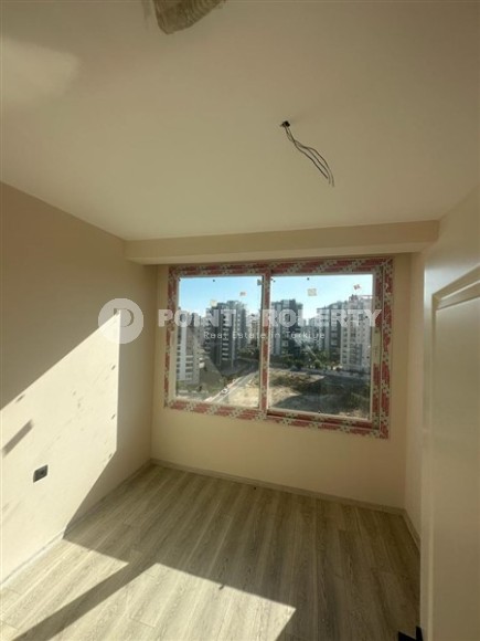 Две новые квартиры на 9-м и 10-м этажах, в двух с половиной километрах от моря, в курортном районе Мерсина - Мезитли-id-6380-фото-9