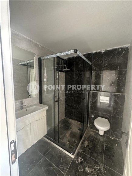 Две новые квартиры на 9-м и 10-м этажах, в двух с половиной километрах от моря, в курортном районе Мерсина - Мезитли-id-6380-фото-10