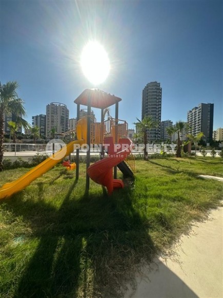 Две новые квартиры на 9-м и 10-м этажах, в двух с половиной километрах от моря, в курортном районе Мерсина - Мезитли-id-6380-фото-12