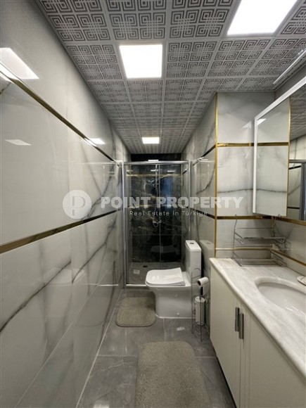 Spacious, comfortable apartment, on an area of 135 m2, in the center of the developed area of Alanya - Mahmutlar-id-6382-photo-6