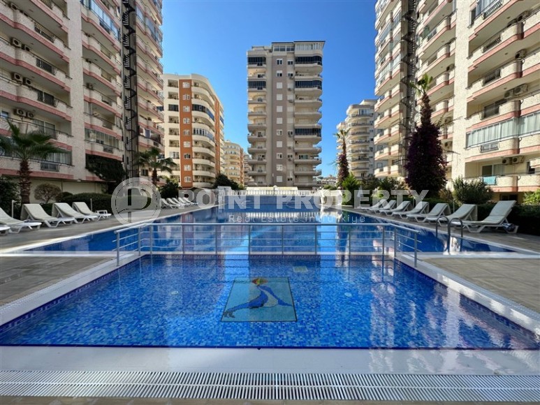 Spacious, comfortable apartment, on an area of 135 m2, in the center of the developed area of Alanya - Mahmutlar-id-6382-photo-12