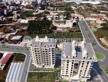 Luxury apartments in a complex with an excellent location, the center of the Mahmutlar district. 700 meters to the sea.-id-1068-photo-1