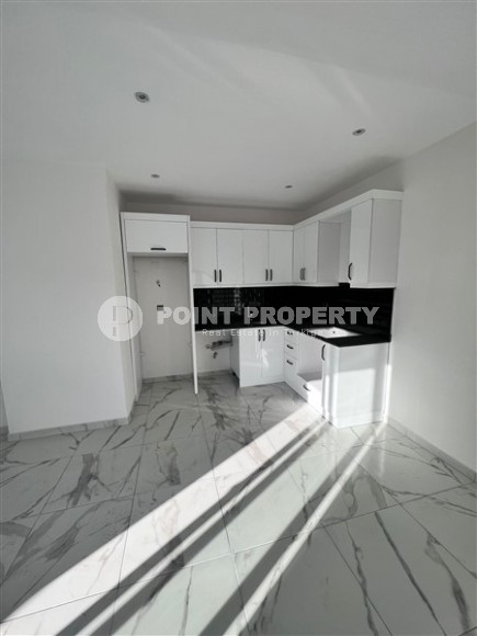 Spacious duplex 3+1, with a total area of 152 m2, on the 4th floor with attic, in the center of Alanya-id-6387-photo-2
