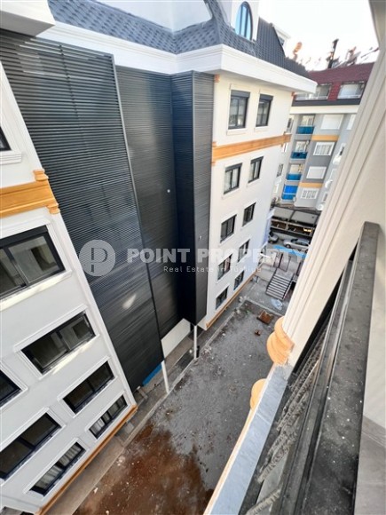 Spacious duplex 3+1, with a total area of 152 m2, on the 4th floor with attic, in the center of Alanya-id-6387-photo-14