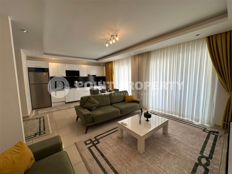 Современная двухуровневая квартира с просторной открытой террасой, на 1-м и 2-м этажах, в центре престижного района Аланьи - Кестель-id-6389-фото-2