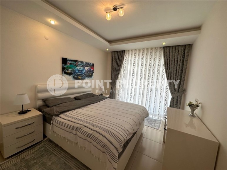 Современная двухуровневая квартира с просторной открытой террасой, на 1-м и 2-м этажах, в центре престижного района Аланьи - Кестель-id-6389-фото-3