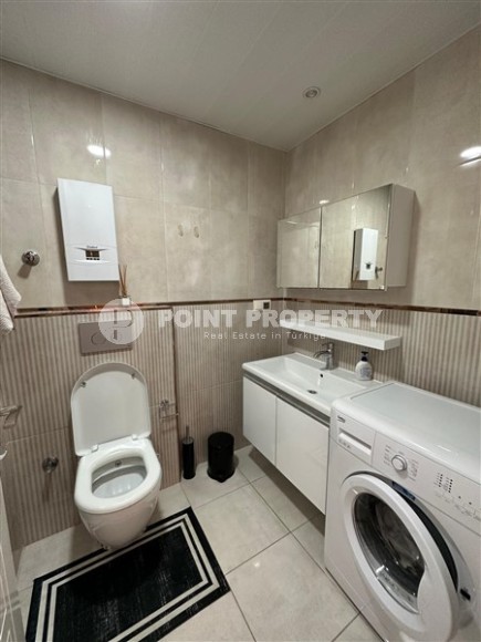 Современная двухуровневая квартира с просторной открытой террасой, на 1-м и 2-м этажах, в центре престижного района Аланьи - Кестель-id-6389-фото-9