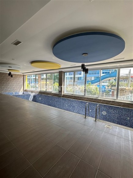 Современная двухуровневая квартира с просторной открытой террасой, на 1-м и 2-м этажах, в центре престижного района Аланьи - Кестель-id-6389-фото-16