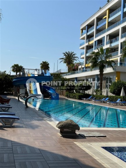 Современная двухуровневая квартира с просторной открытой террасой, на 1-м и 2-м этажах, в центре престижного района Аланьи - Кестель-id-6389-фото-17