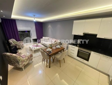 Cozy 1+1 apartment, with a total area of 55 m2, in a calm, comfortable area of Alanya - Cikcilli-id-6395-photo-3