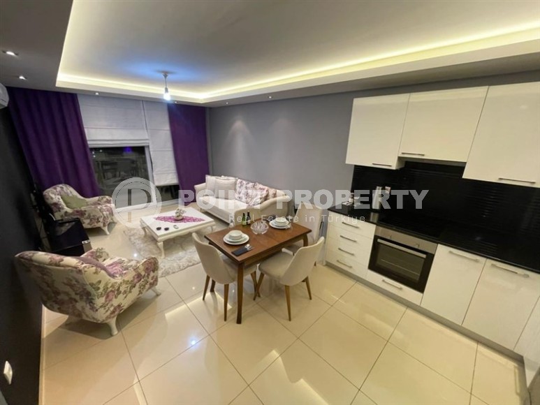 Cozy 1+1 apartment, with a total area of 55 m2, in a calm, comfortable area of Alanya - Cikcilli-id-6395-photo-3