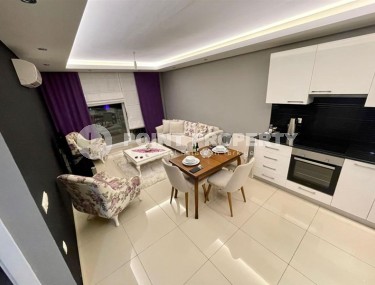 Cozy 1+1 apartment, with a total area of 55 m2, in a calm, comfortable area of Alanya - Cikcilli-id-6395-photo-4