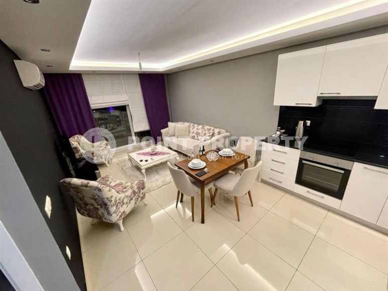 Cozy 1+1 apartment, with a total area of 55 m2, in a calm, comfortable area of Alanya - Cikcilli-id-6395-photo-4