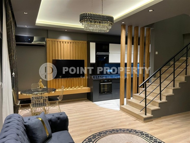 Стильная двухуровневая квартира с дизайнерским ремонтом, на 5-м этаже с мансардой, в живописном, спокойном районе Аланьи - Демирташ-id-6396-фото-4