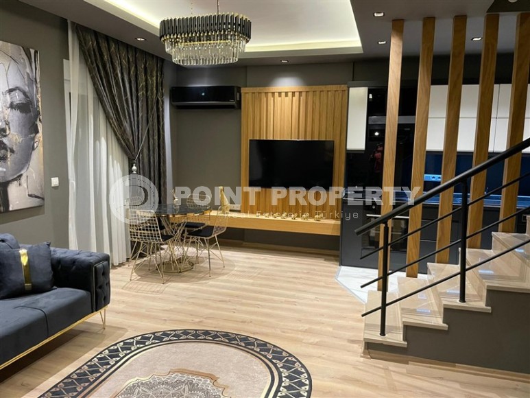 Стильная двухуровневая квартира с дизайнерским ремонтом, на 5-м этаже с мансардой, в живописном, спокойном районе Аланьи - Демирташ-id-6396-фото-5