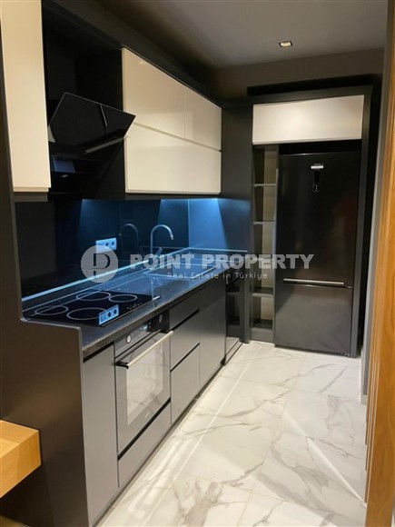 Стильная двухуровневая квартира с дизайнерским ремонтом, на 5-м этаже с мансардой, в живописном, спокойном районе Аланьи - Демирташ-id-6396-фото-6