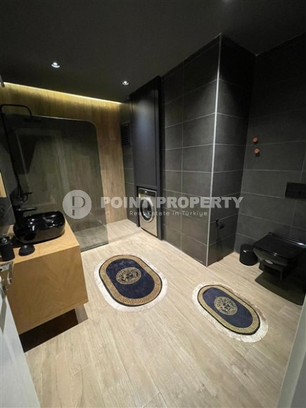 Стильная двухуровневая квартира с дизайнерским ремонтом, на 5-м этаже с мансардой, в живописном, спокойном районе Аланьи - Демирташ-id-6396-фото-15