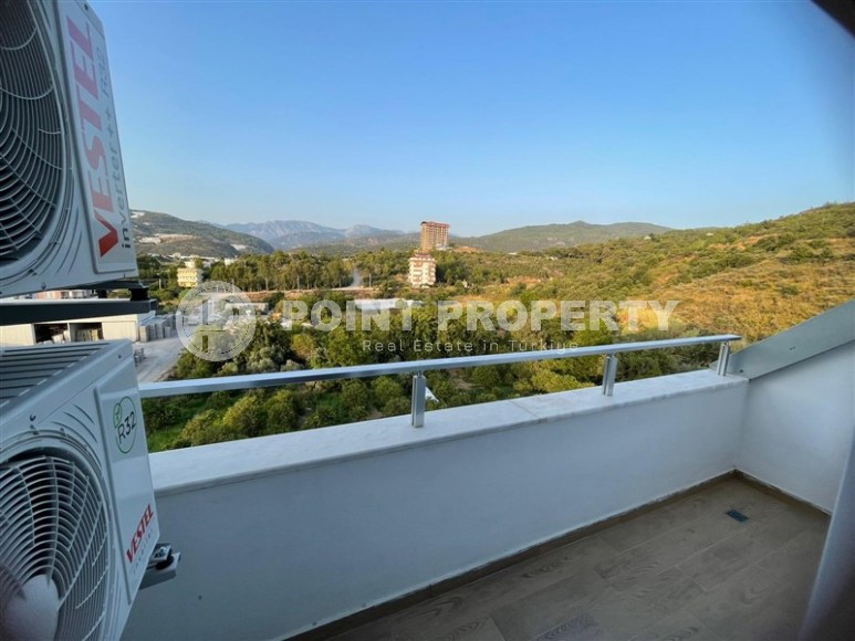 Стильная двухуровневая квартира с дизайнерским ремонтом, на 5-м этаже с мансардой, в живописном, спокойном районе Аланьи - Демирташ-id-6396-фото-16