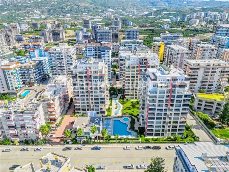 Atmospheric, modern apartment 2+1, with a total area of 130 m2, in the center of the developed area of Alanya - Mahmutlar-id-6400-photo-24