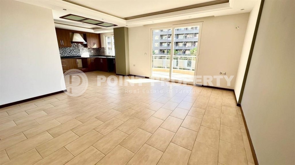 Квартира с чистовой отделкой, на 2-м этаже в доме 2009 года постройки, в центре района Махмутлар-id-6404-фото-3