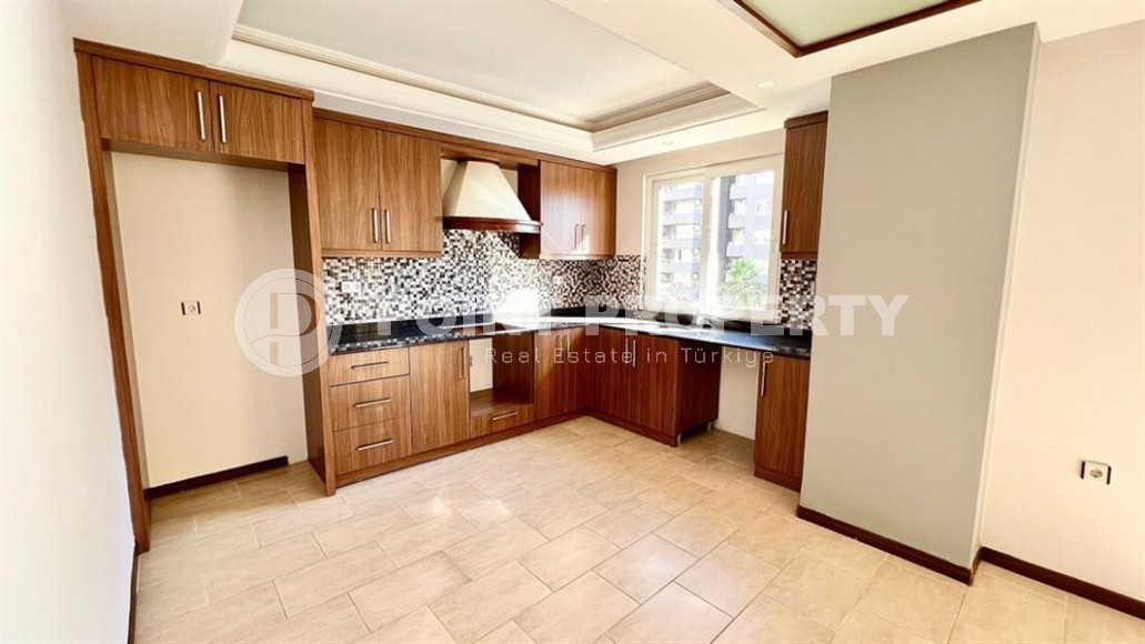 Квартира с чистовой отделкой, на 2-м этаже в доме 2009 года постройки, в центре района Махмутлар-id-6404-фото-4