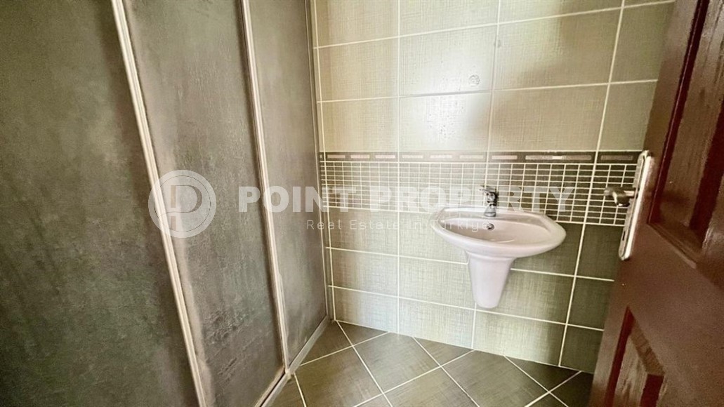 Квартира с чистовой отделкой, на 2-м этаже в доме 2009 года постройки, в центре района Махмутлар-id-6404-фото-9