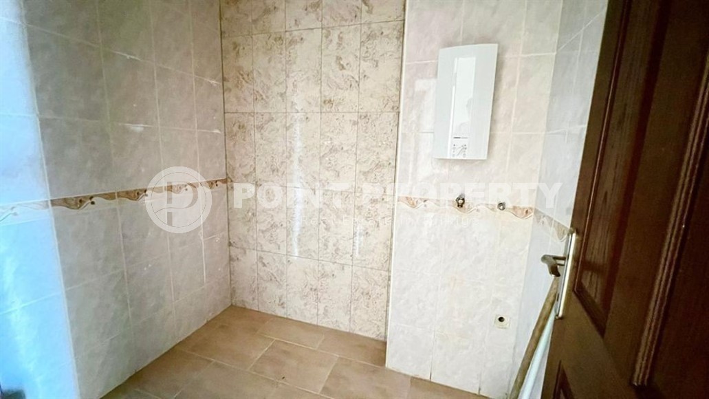 Квартира с чистовой отделкой, на 2-м этаже в доме 2009 года постройки, в центре района Махмутлар-id-6404-фото-11