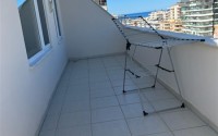 Large two-level apartment 2+1, with a total area of 150 m2, on the 5th floor with an attic, in the center of Mahmutlar district-id-6406-photo-14