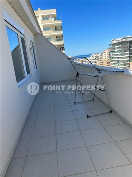 Large two-level apartment 2+1, with a total area of 150 m2, on the 5th floor with an attic, in the center of Mahmutlar district-id-6406-photo-14