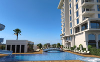 Luxury apartments in a complex with an excellent location, the center of the Mahmutlar district. 700 meters to the sea.-id-1068-photo-5